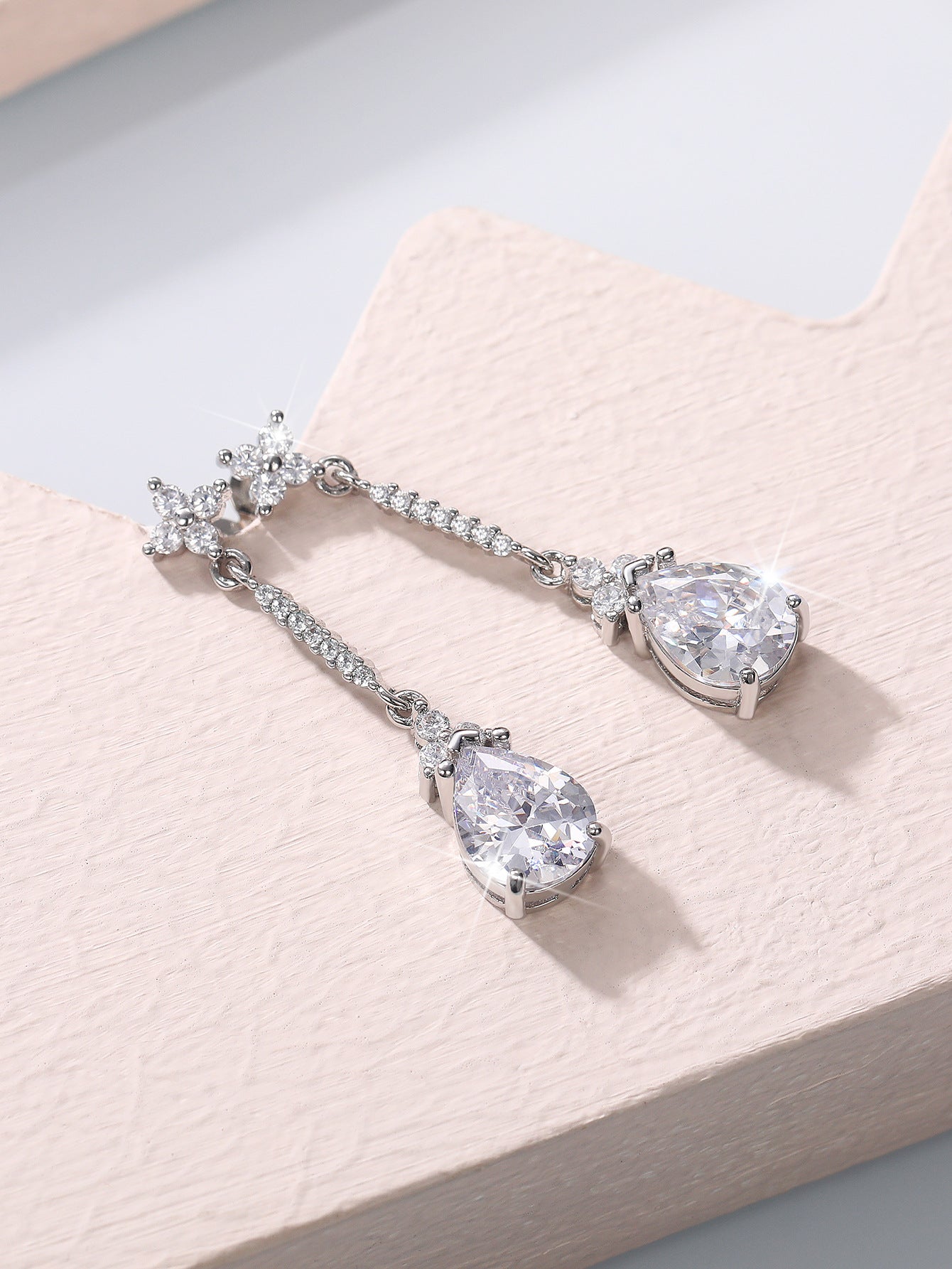 47.Shiny 3A white zircon pear-shaped water drop earrings for women, popular temperament versatile and elegant earrings